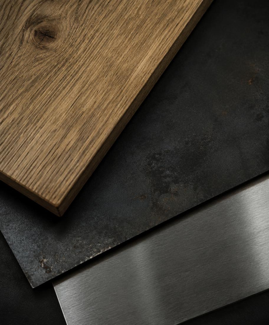Wood, dark metal and brushed metal materials
